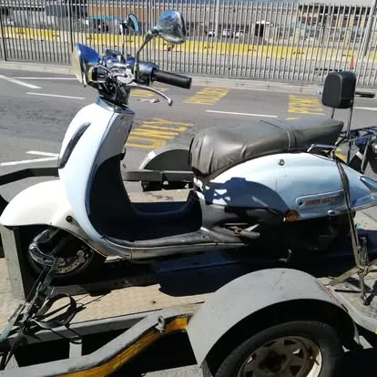 Scooter loaded on Erik's trailer for collection